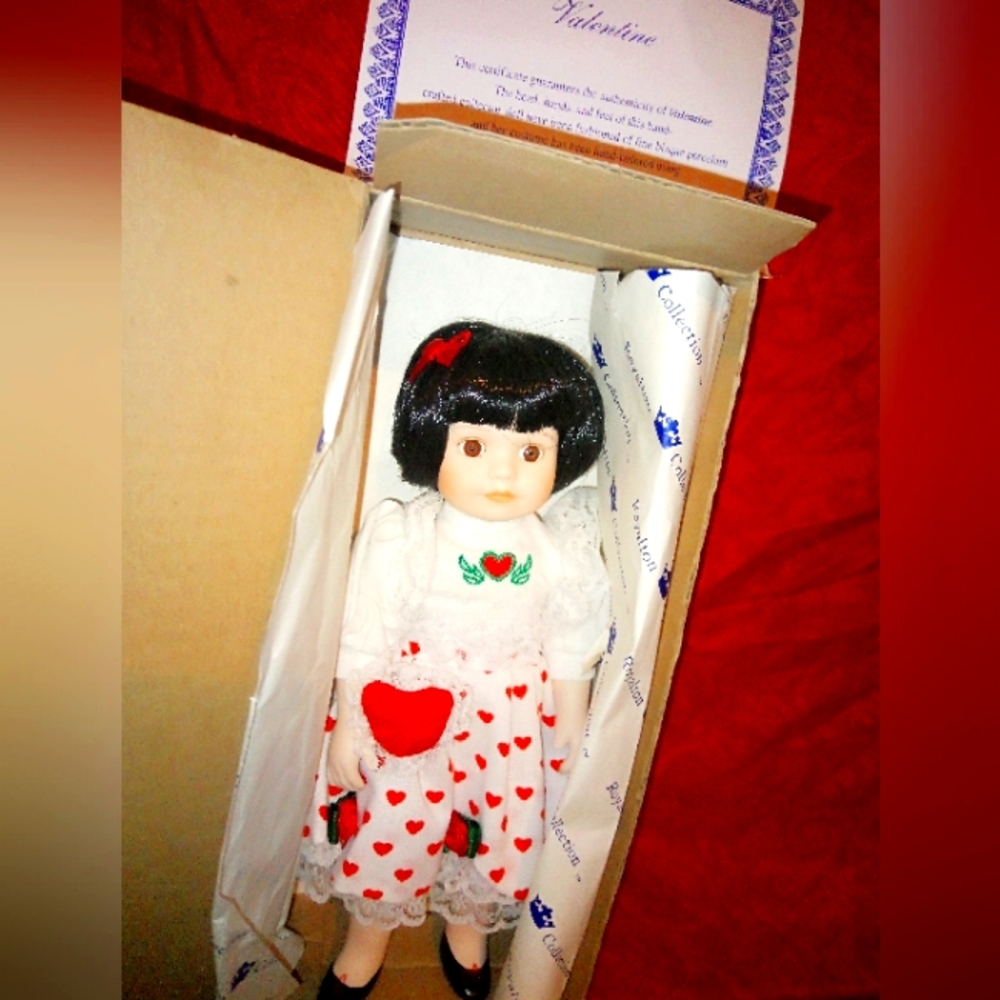 She is a valentine porcelain doll brand new